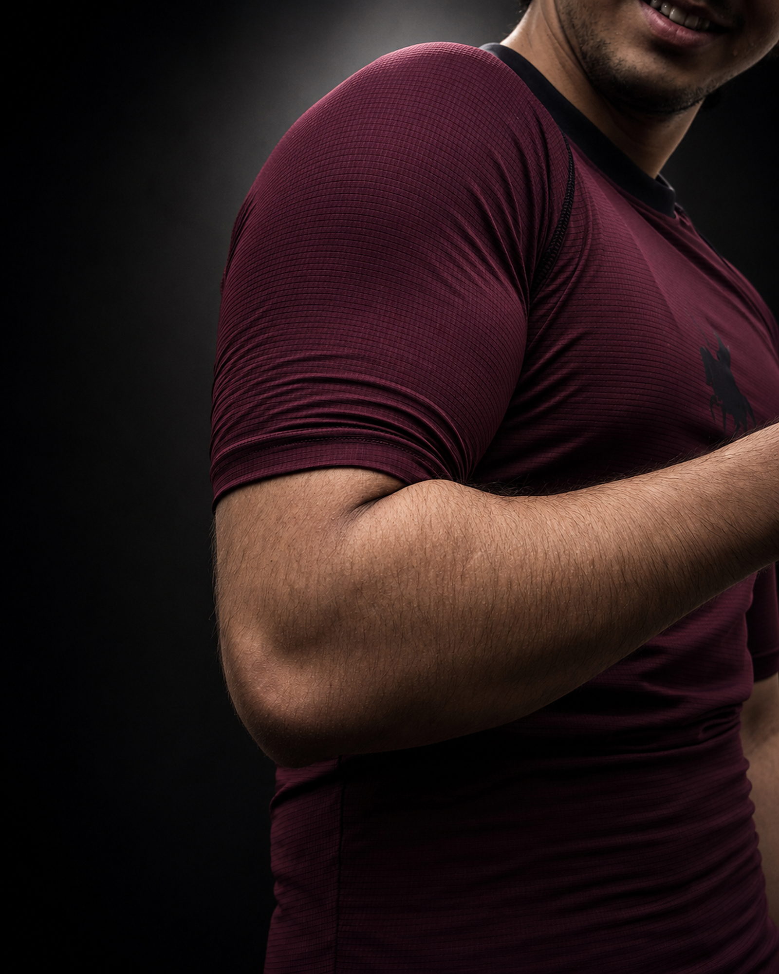 The Shield — Maroon · Sleeve and seam detail