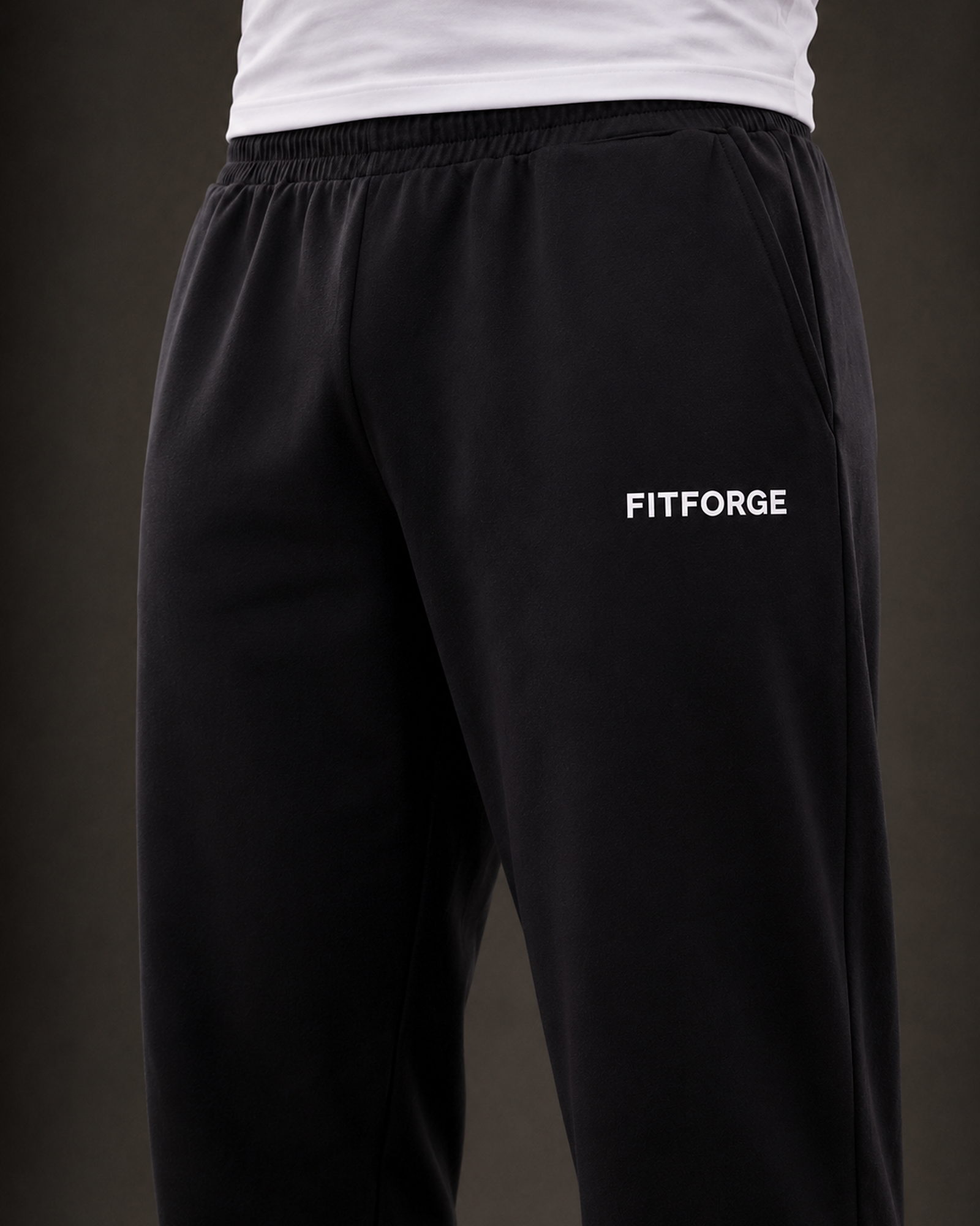 The Apex Trouser — Men's · Waistband and wordmark detail